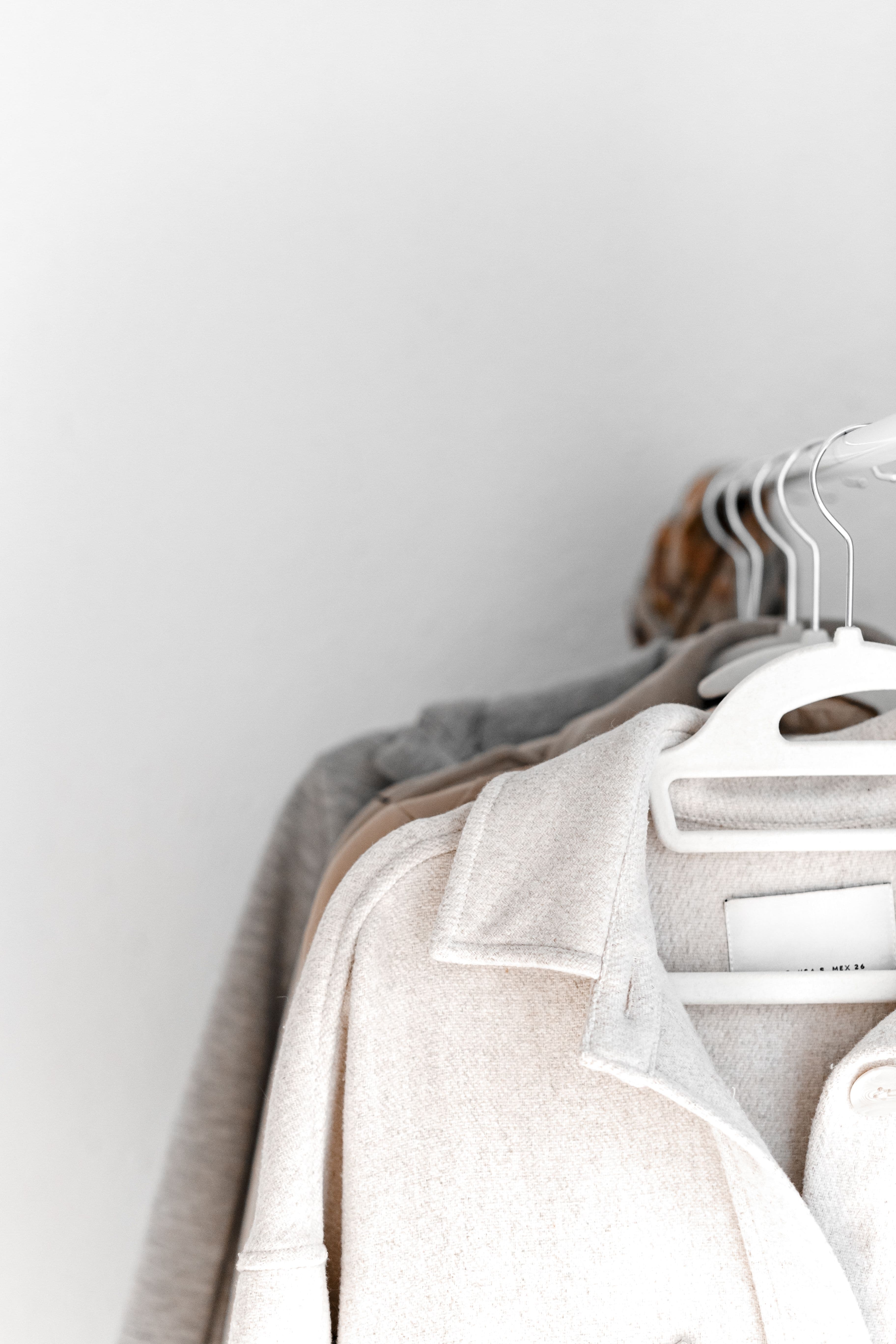 Garments hanging neatly after professional care